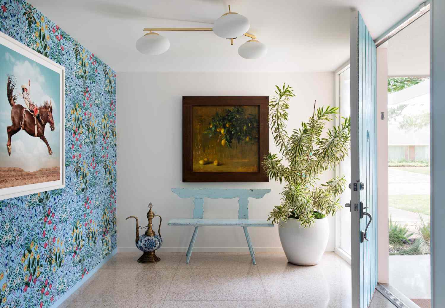 Green patterned wallcovering in a refined interior